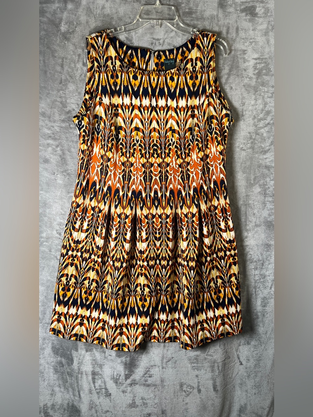 Gabby Skye Sleeveless Mini Dress in Orange, Navy, and Cream